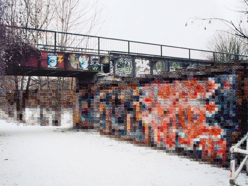 Trace the history of the berlin wall through embroidered pixels