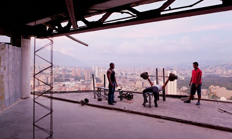 Iwan baan’s best shot: squatters at the tower of david in venezuela