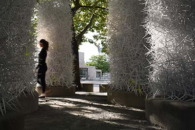 Huge, elaborate structures made of random heaps of plastic