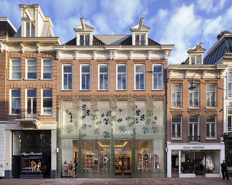 MVRDV complete Crystal Houses Amsterdam, a flagship store with a replica façade made entirely out of glass
