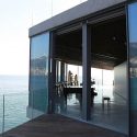 This sculpted house designed by soma is hovering over the mediterranean