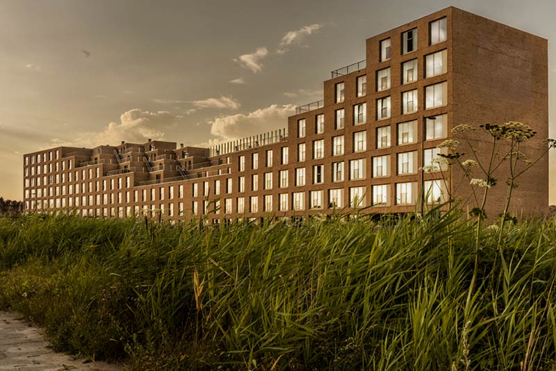 Studioninedots completes Smiley Zeeburgereiland apartment complex in Amsterdam