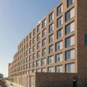 Studioninedots completes smiley zeeburgereiland apartment complex in amsterdam