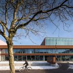 The new vendsyssel theatre, designed by schmidt hammer lassen, opens to a sell-out season in hjørring, denmark