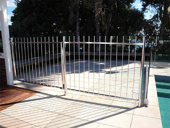 Shiny steel fence and metal gate