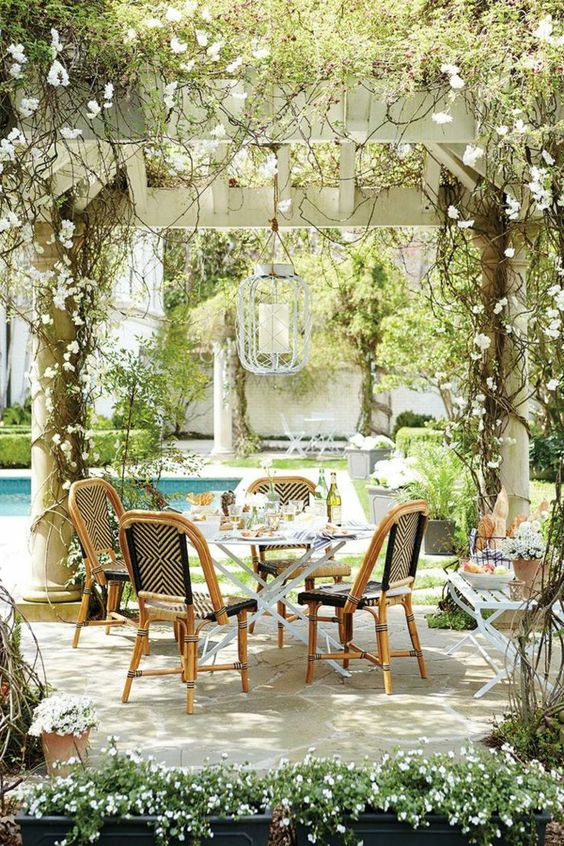 Vines and flowers as centerpieces on a magical patio