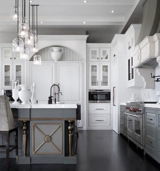 White kitchen cabinets paired with classic gray kitchen cabinets