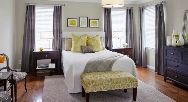 Stylish bench at the foot of the bed in yellow