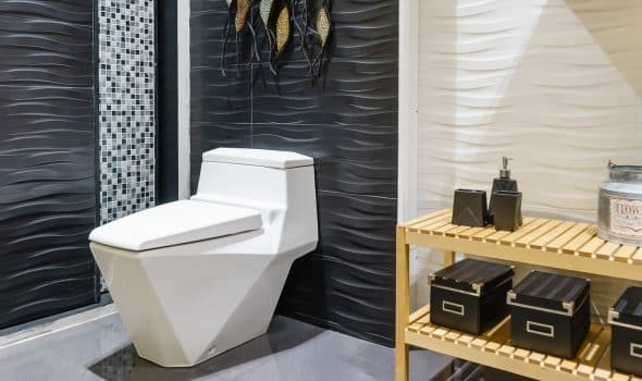 White urinal and washbasin and shower in granite bathroom, modern house bathroom interior, luxury bathroom