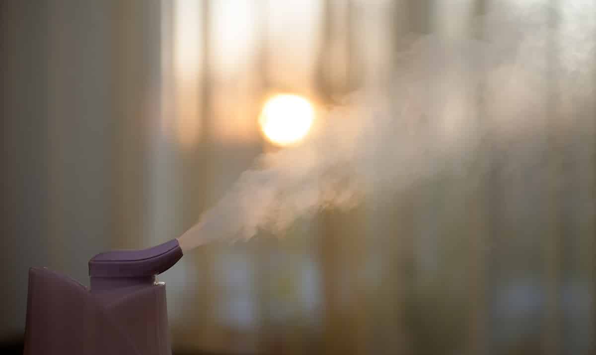 Humidifier in a living room at sunset