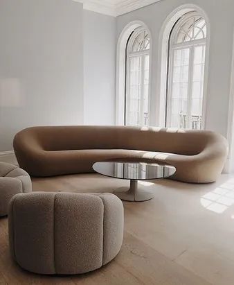 Living room with curvy sofa rounded sofa
