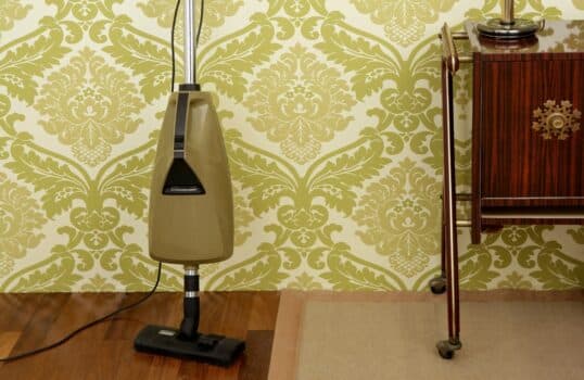 Retro vacuum cleaner vintage sixties room green wallpaper