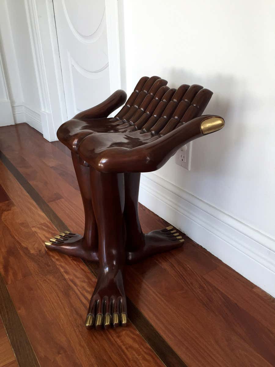 Rare editioned bronze hand and feet chair