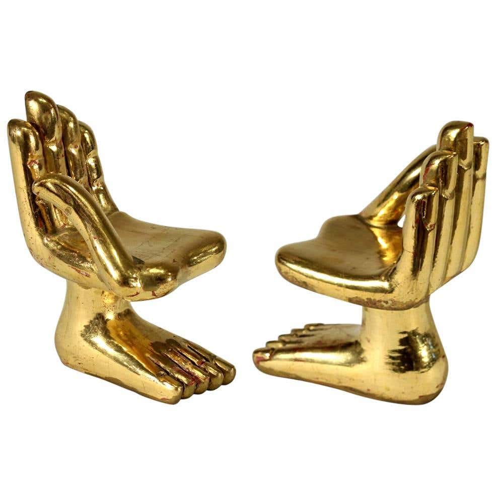 Two hand foot sculptures