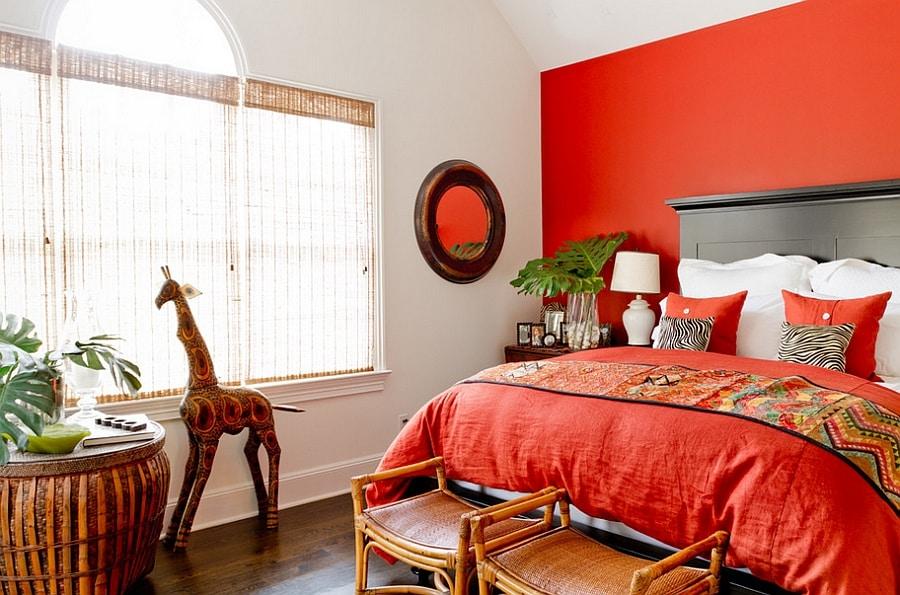 Red orange wall infuses the room with energy