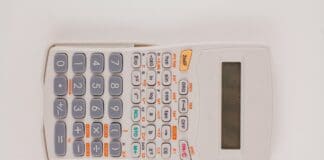 a large engineering calculator on white background. Calculator For Scientific Notation.