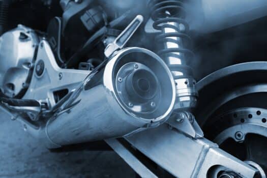 The working muffler of a modern motorcycle. Chrome paint how to conclusion.