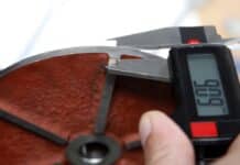 Measuring metal using a digital scale caliper. How To Repair Digital Vernier Caliper.