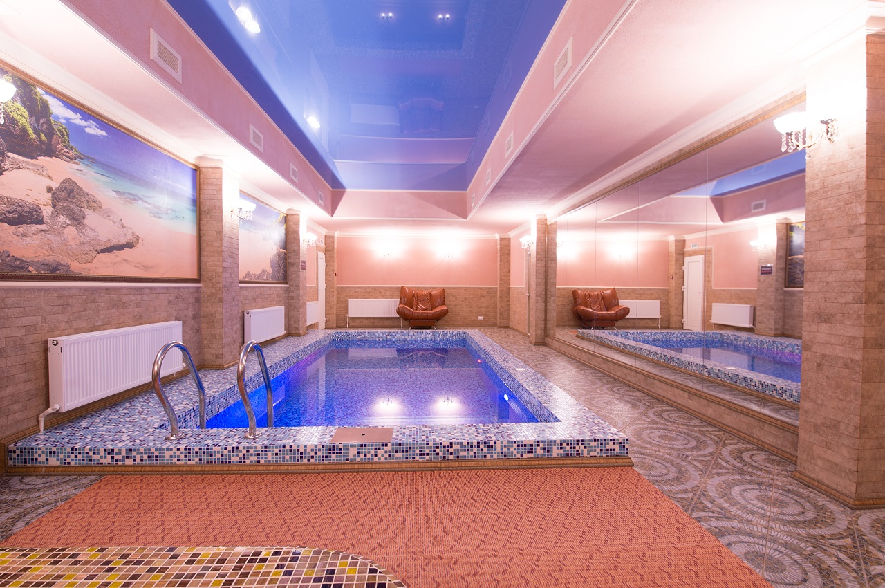 Indoor swimming pool in hotel spa center. Indoor pool.
