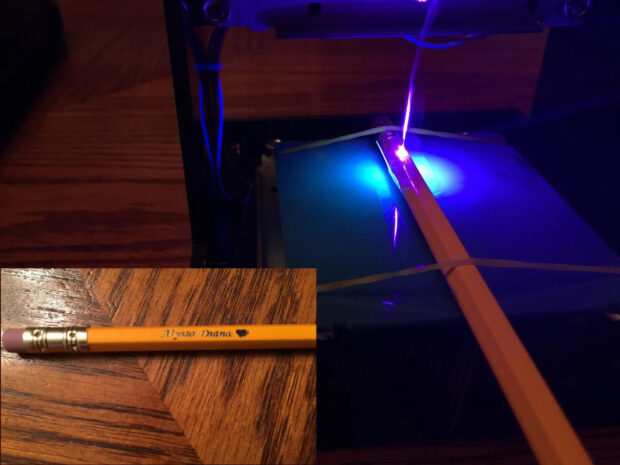 Laser engraving a pencil with a name