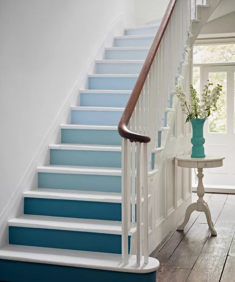 Adding freshness by painting the stairs in ombre colors