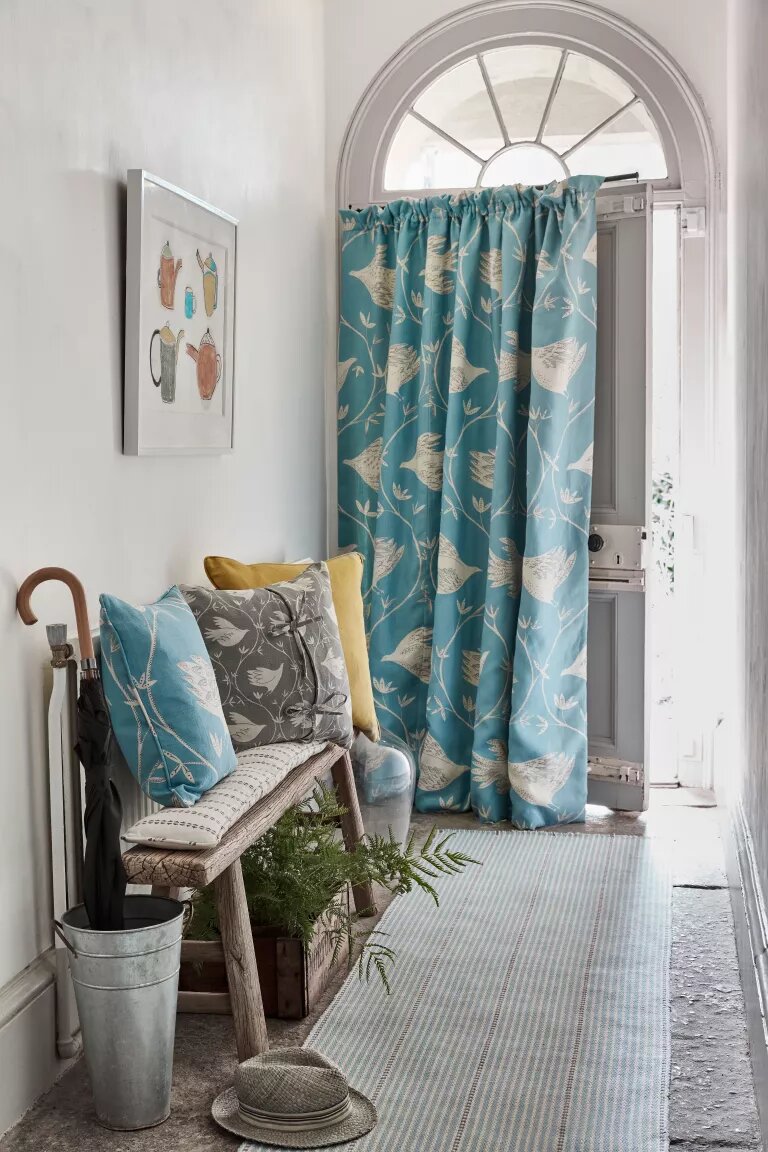 Adding interest by putting up a door curtain