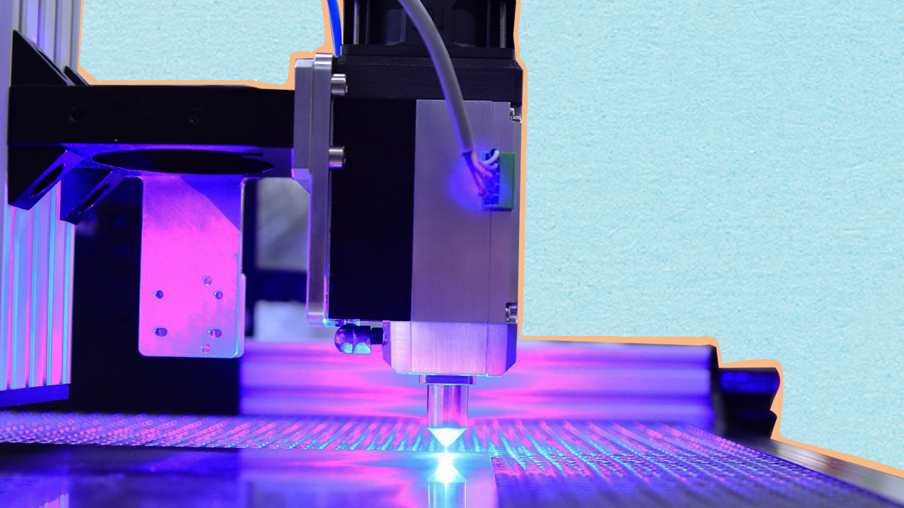 laser engraver emitting laser light