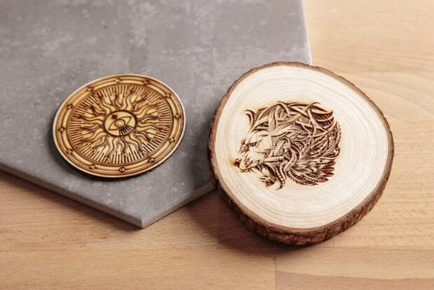 Portrait of a lion and a sun on a round piece of wood