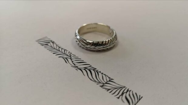 Laser engraved ring with leaf design