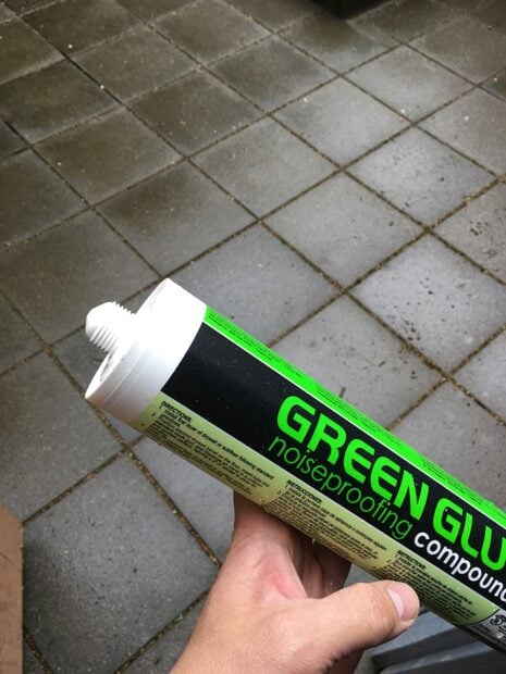 Man holding a green glue