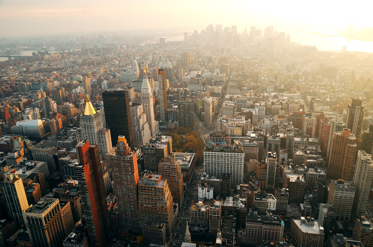 New york city manhattan panorama aerial view with skyline at sunset. What's the problem with american cities?