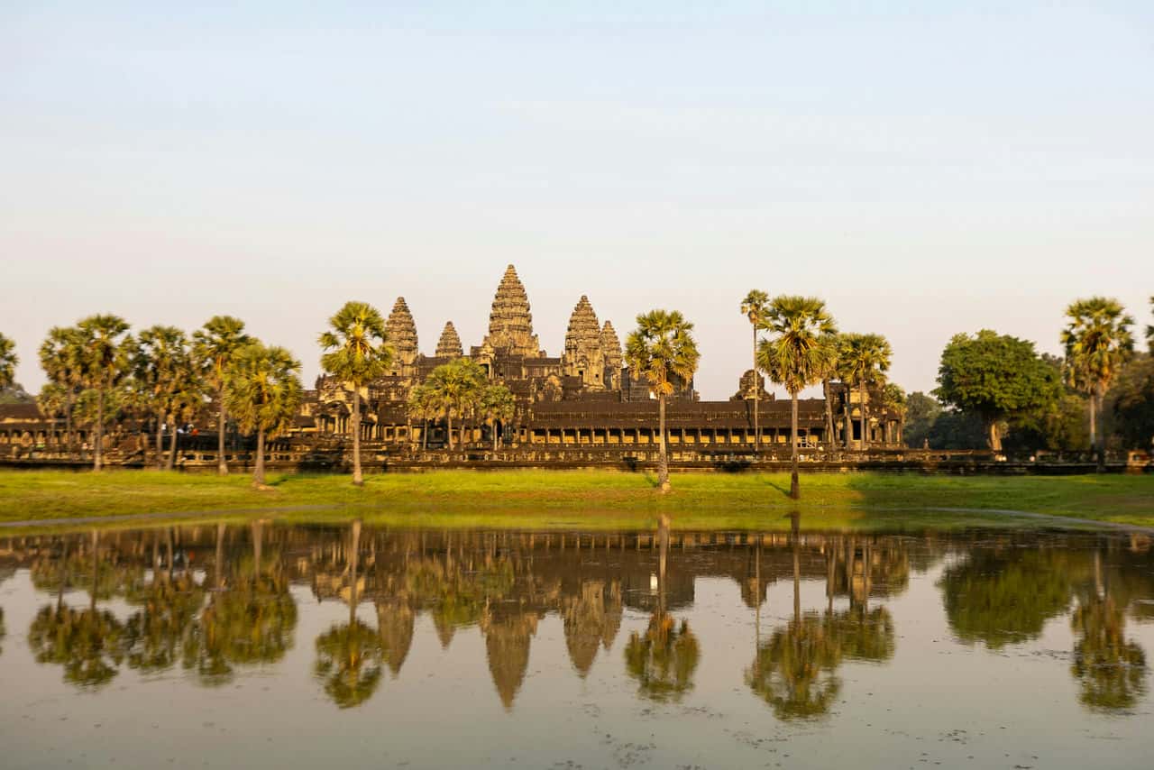 Angkor wat temple complex across water © serg alesenko