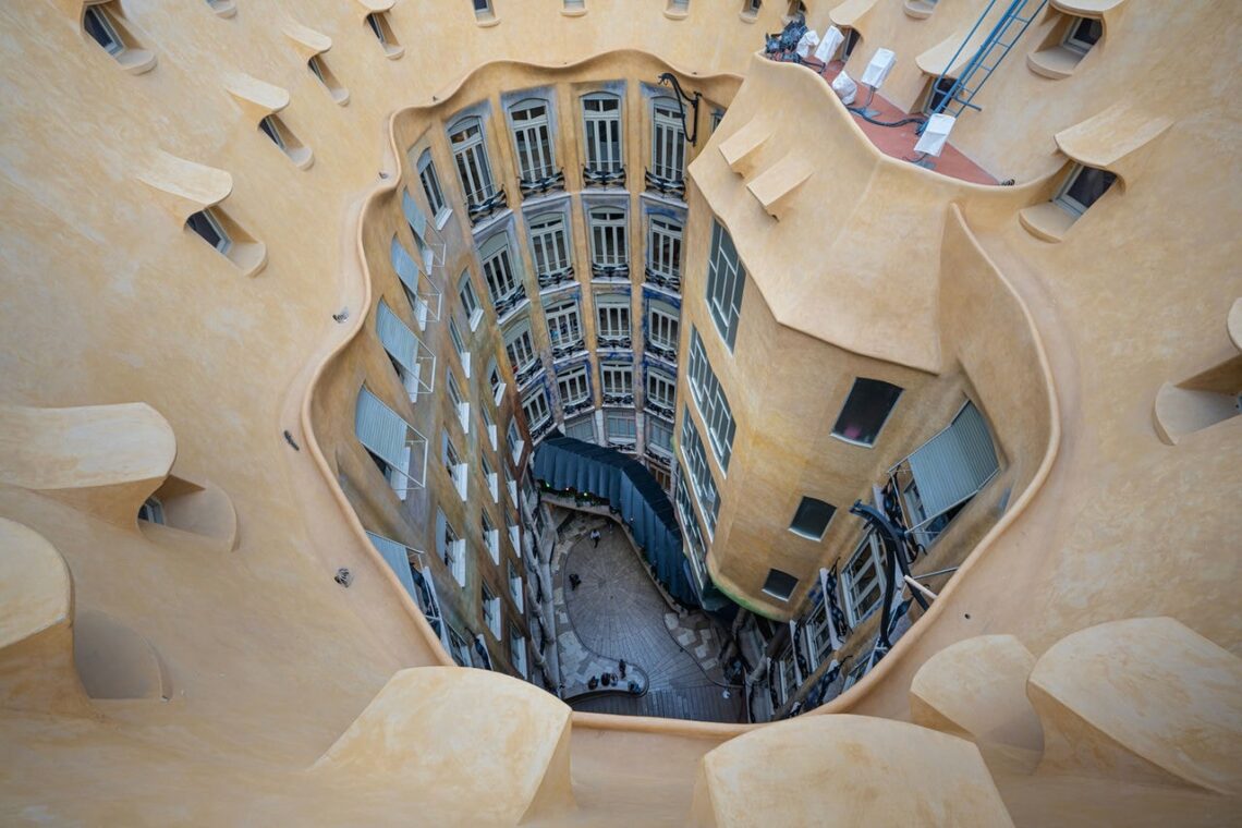 Antoni Gaudí: Biography, Works, Awards 156 Antoni gaudi: casa mila courtyard looking down © dominik gehl
