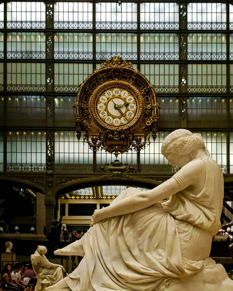 Architectural landmark: musée d’orsay, clock and sculpture © laura f. T.