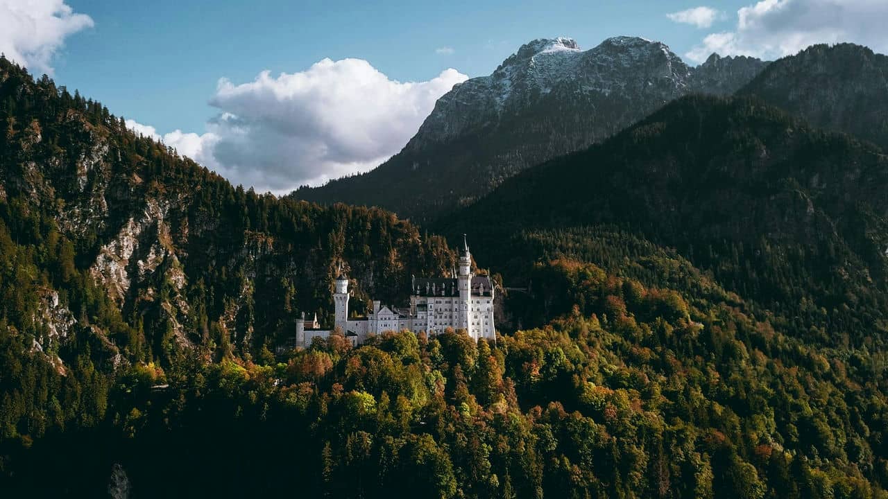Architectural landmark: neuschwanstein castle mountain background © kayle kaupanger