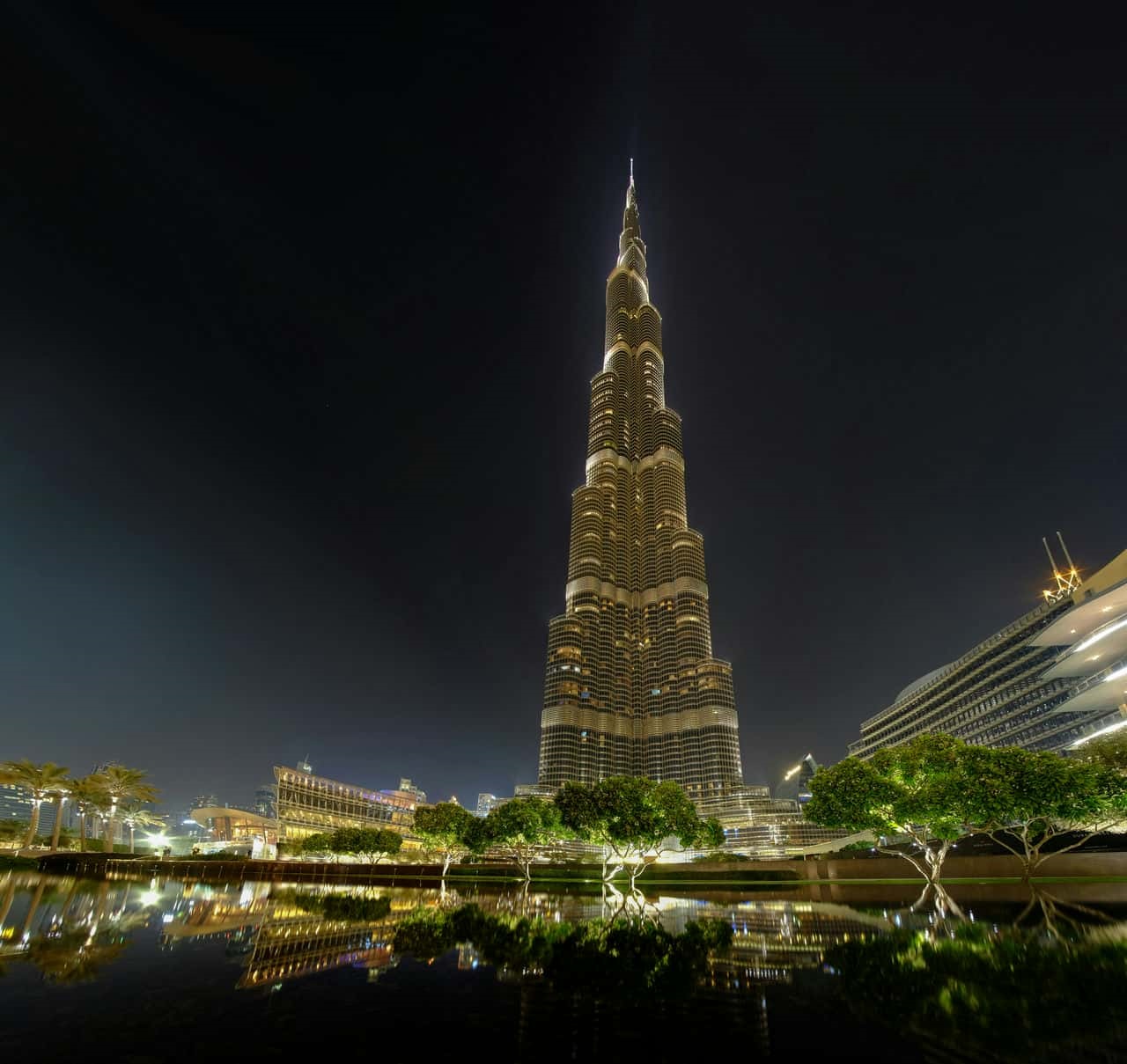 Burj khalifa night view across dubai fountain © zoltan tasi