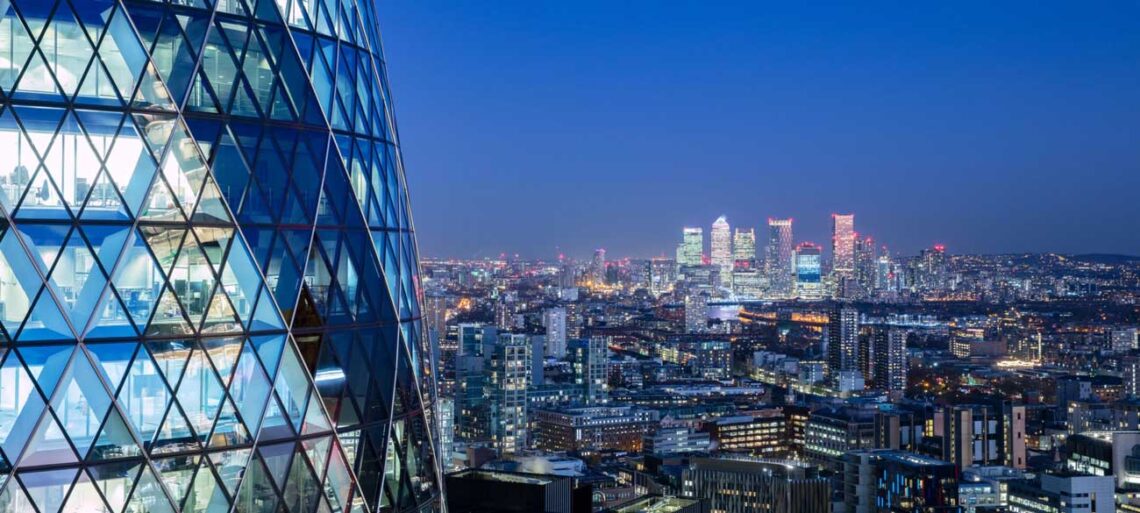 Foster+partners: the gherkin exterior closeup with stunning city lights
