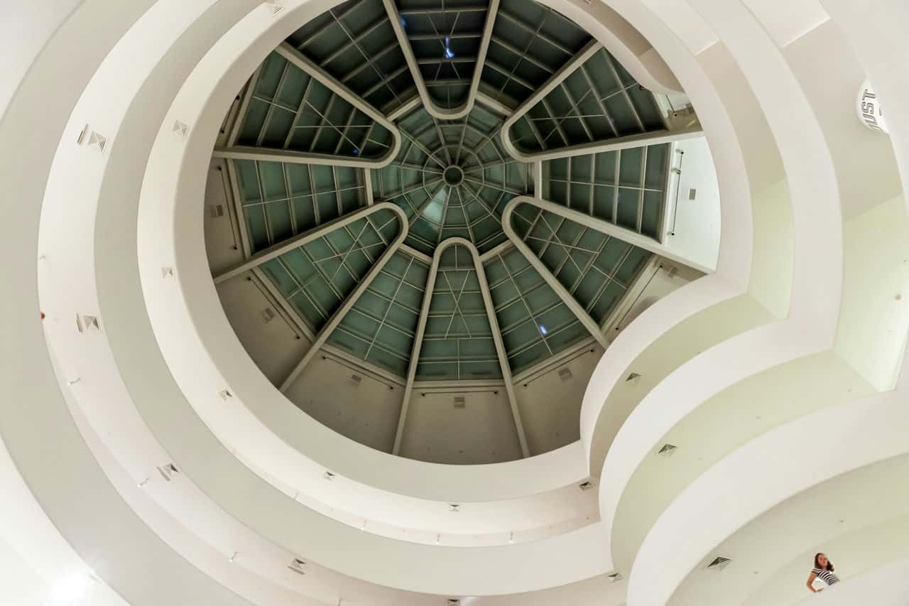 Guggenheim museum nyc interior lit up during nighttime © reno laithienne