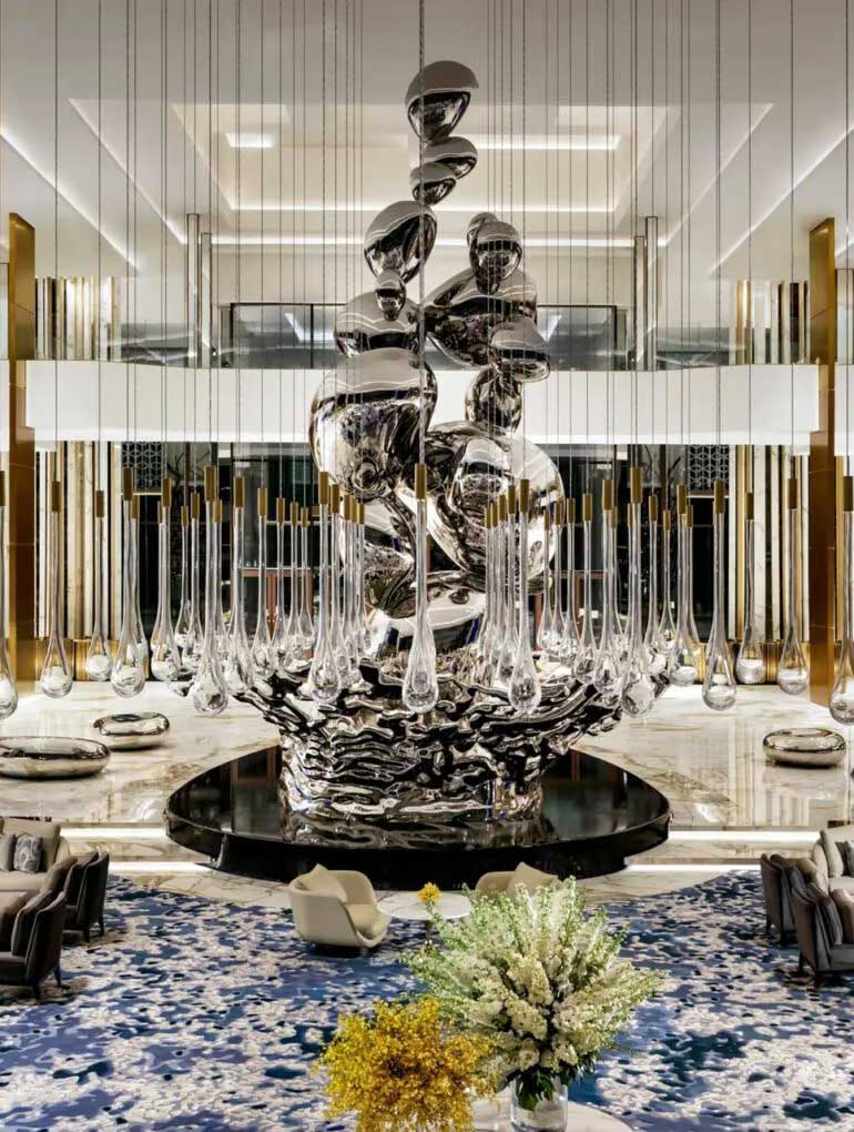 Ibi group: atlantis the royal droplets 37. 7 feet tall sculpture sits in the lobby