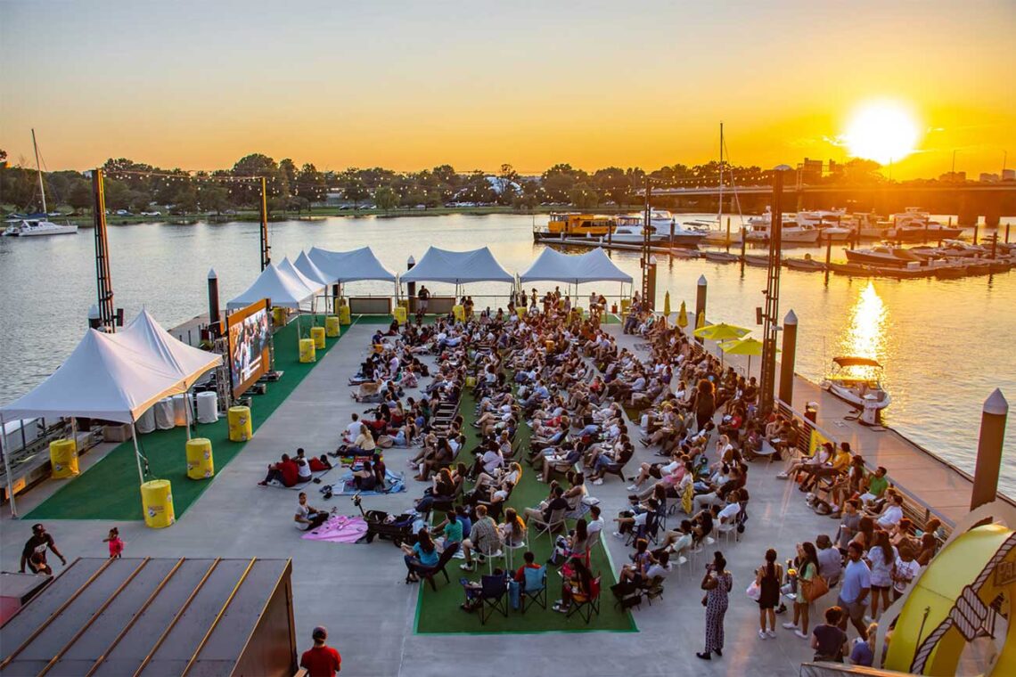 Perkins eastman: district wharf free outdoor movies on transit pier