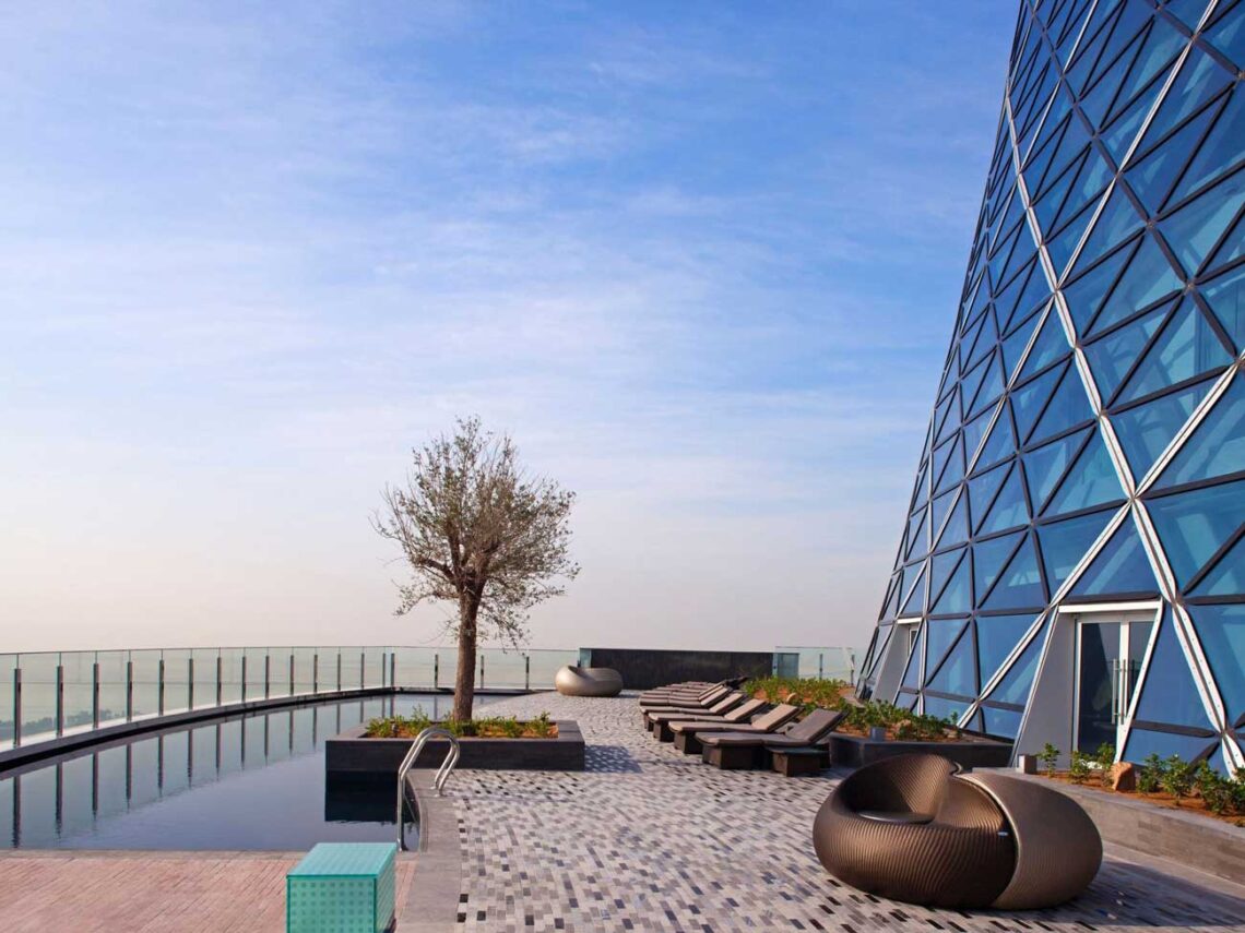 Rmjm: capital gate andaz pool deck suspended 19 floors above the ground