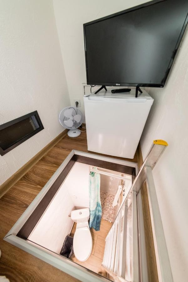 Smallest apartment in the world: ladder direct to comfort room © krakow hotels