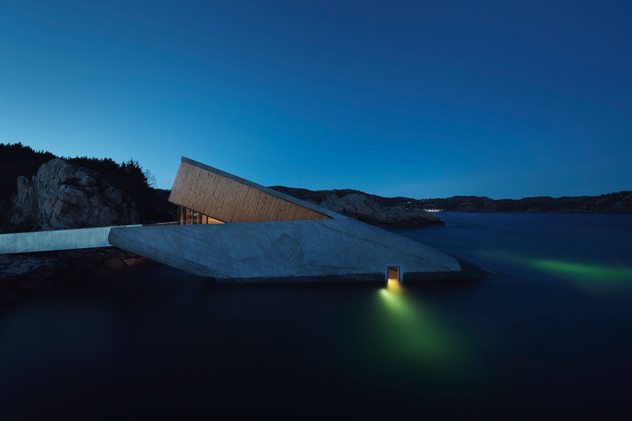 Snøhetta: under, norway - europe's first underwater restaurant offering a unique dining experience amidst marine life, unveiled in 2019. © ivar kvaal