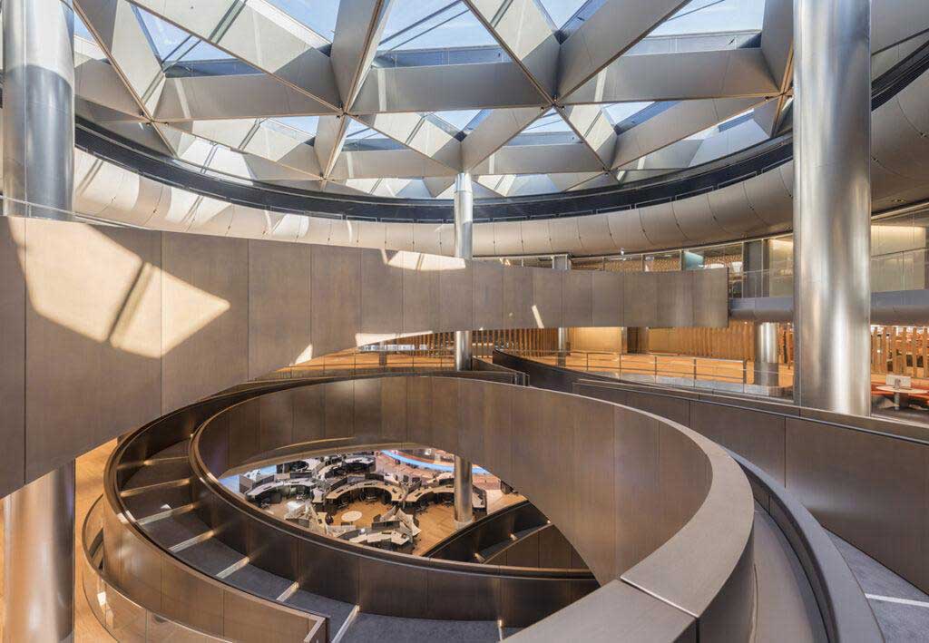 Sweco: bloomberg european headquarters intertwining ramps connecting floors