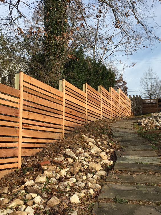 9. Simply slats form a wood fence