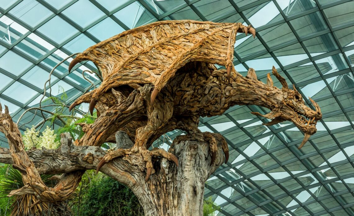 Architectural landmark: gardens by the bay driftwood wyvern at flower of dome © russell scott