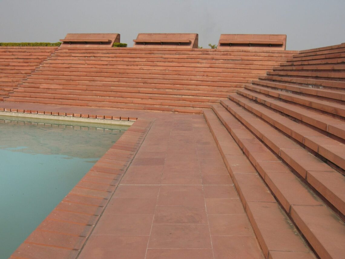 Architectural landmark: lotus temple stairs and pool © brady montz