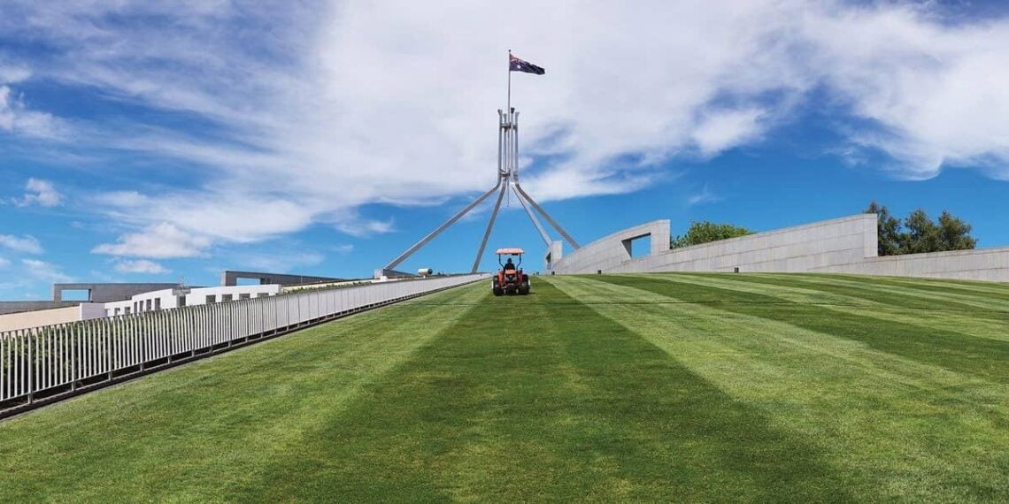 Architectural landmark: parliament house iconic grass lawn © anne zahalka