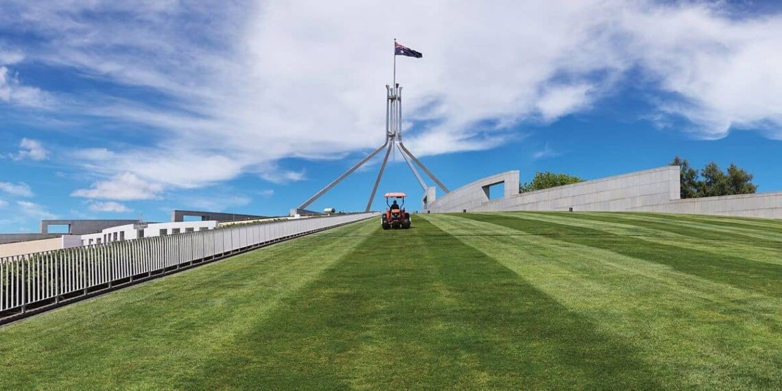 Architectural landmark: parliament house iconic grass lawn © anne zahalka