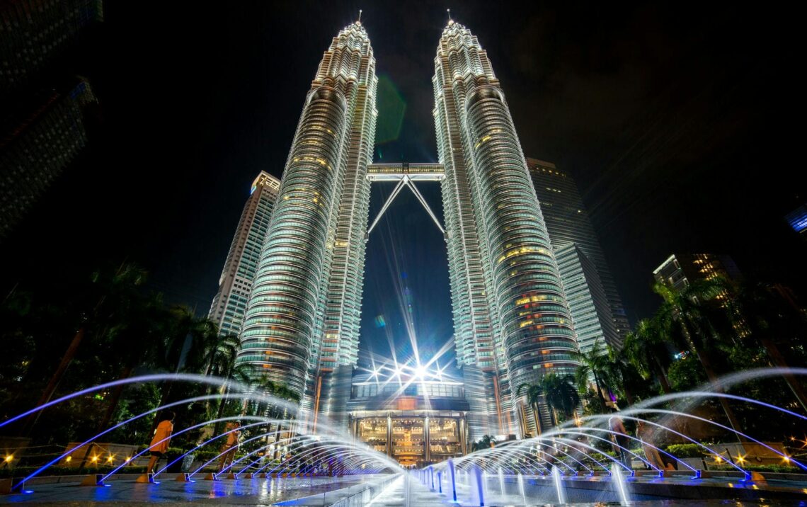 Architectural landmark: petronas twin towers façade at night © ben cheung
